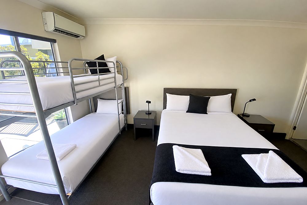 Family Room with a queen bed and bunks